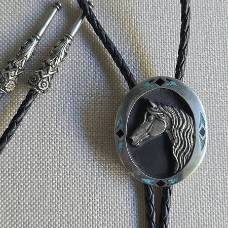 Cravate Cowboy ou Bolo Tie Western, neuf
