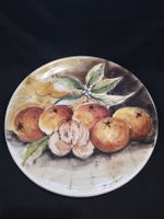 Assiette décorative vintage en céramique d'artisanat suisse.