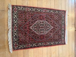 Teppich rot gemustert 108x77 cm guter Zustand