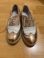 Chaussures dorées taille 38