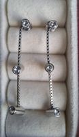 Boucles d'oreilles pendantes argentées Swatch Lustro