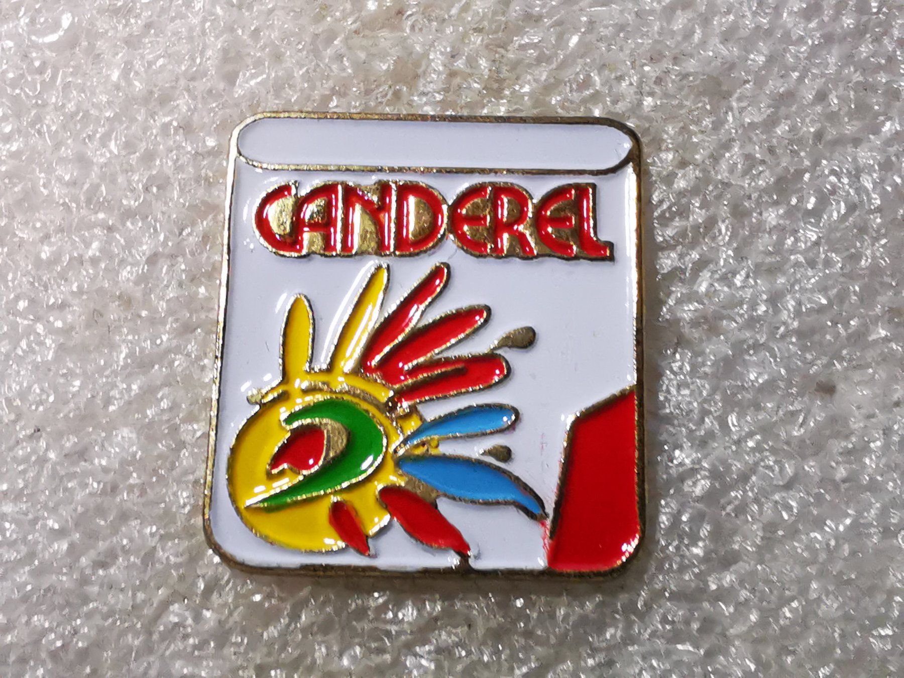 Placchette & Badge: Ansteckpin 71: Canderel – Usato da Oppligen venduto da Pin-Fall-Shop