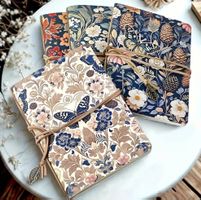 4 Hefte - SET / mit Schmetterlings- und Blumenmotiven / A5
