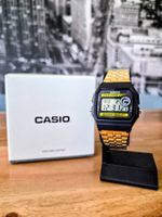 Neue Casio F94W – ungetragen / mit goldenem Stahlarmband