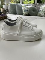 White leather sneakers