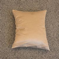 Titel: Dekokissen in Creme/Beige
