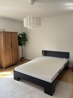 Bettgestell schwarz mit Lattenrost und Kopfteil 160cm