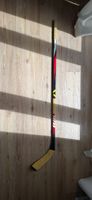 Canne de hockey Bauer rouge noir état très correct 