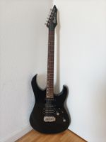 Cort G Series electric guitar in black finish.
