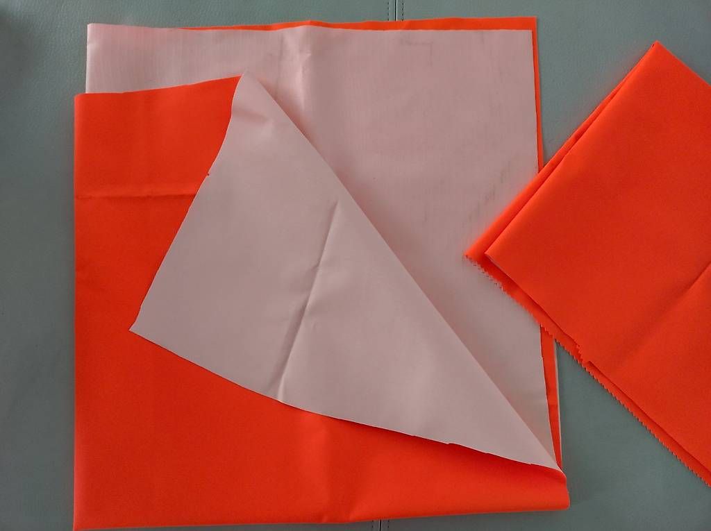 Tessuti: STOFFRESTEN Plastifiziert neon-orange – Usato da Oberwil BL venduto da Fgquerschleeger 1