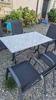 Schöner Gartentisch mit Granitplatte & Gusseisen-Gestell