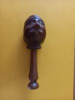 Casse-noix ancien sculpté en bois représentant une tête