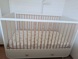 MYLLRA Cot 70x140 cm, toddler rail and JÄTTETRÖTT mattress