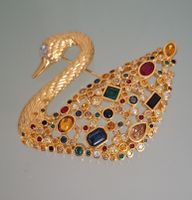 SWAROVSKI VERGOLDETE BROSCHE