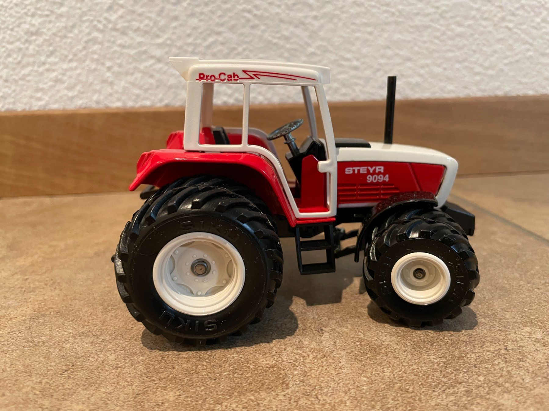 Steyr Trattori: SIKU Steyr 9094 – Nuovo e nell'imballaggio originale da Kreuzlingen venduto da Stefan1150 2