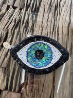 Porte-monnaie ou trousse de maquillage œil
