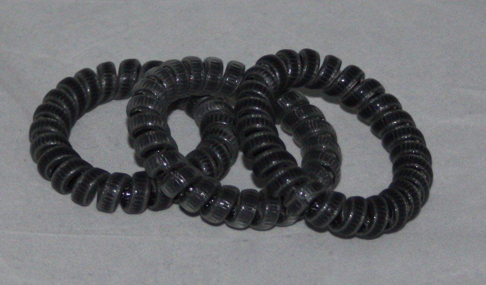 Accessori per capelli: 3 Spiral - Haargummi grau – Usato da Flüelen venduto da Diversicum-Shop