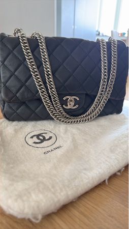 Classic dark blue Chanel Handbag with Silver Chain Detail
