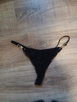 Damen Tanga schwarz mit Spitze und Metall Details