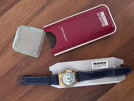 Armbanduhr Swatch Irony goldfarben blaues Lederband