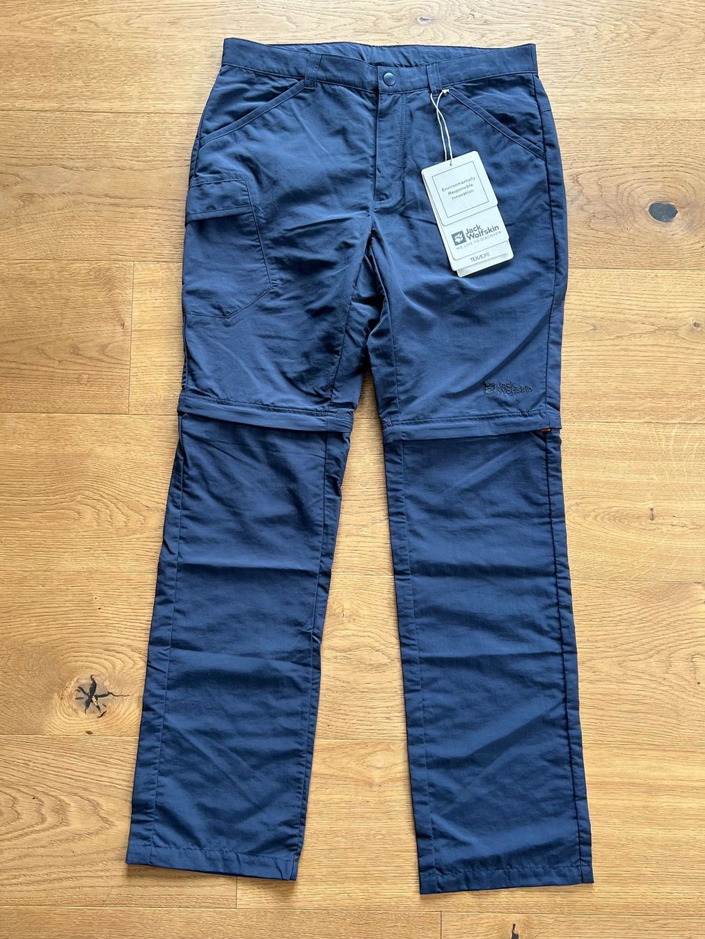 Jack Wolfskin Pantaloni: Neue Jack Wolfskin zip-off Hose Grösse 164 – Nuovo e nell'imballaggio originale da Lengnau BE venduto da Rubin27