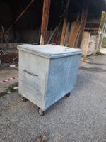 Conteneur à déchets acier galvanisé sur roulettes usagé