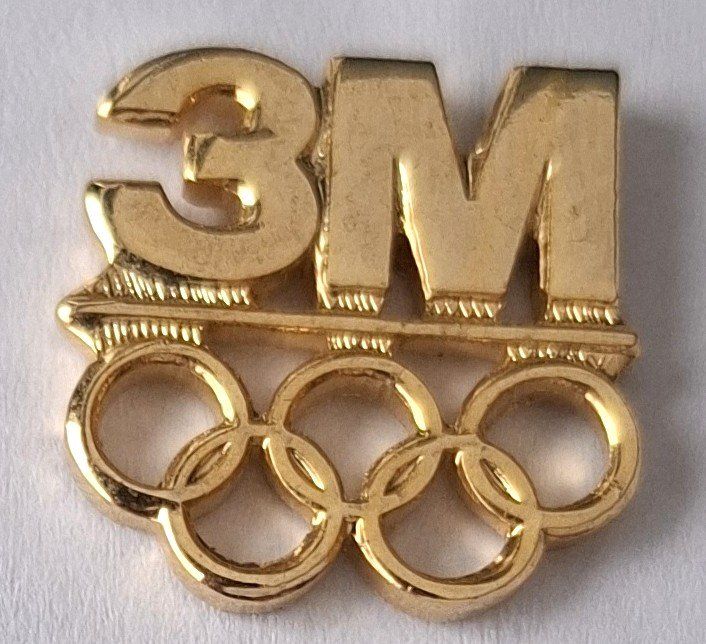 Placchette & Badge: 3 M und Olympische Ringe – Usato da Hinterkappelen venduto da Schampus