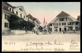 AK Herzogenbuchsee, Dorfplatz mit Eisenwaren Belrichard, Bru