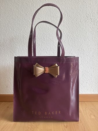 OriginalTed Baker Tasche Lackoptik lila mit Schleife gebrauc