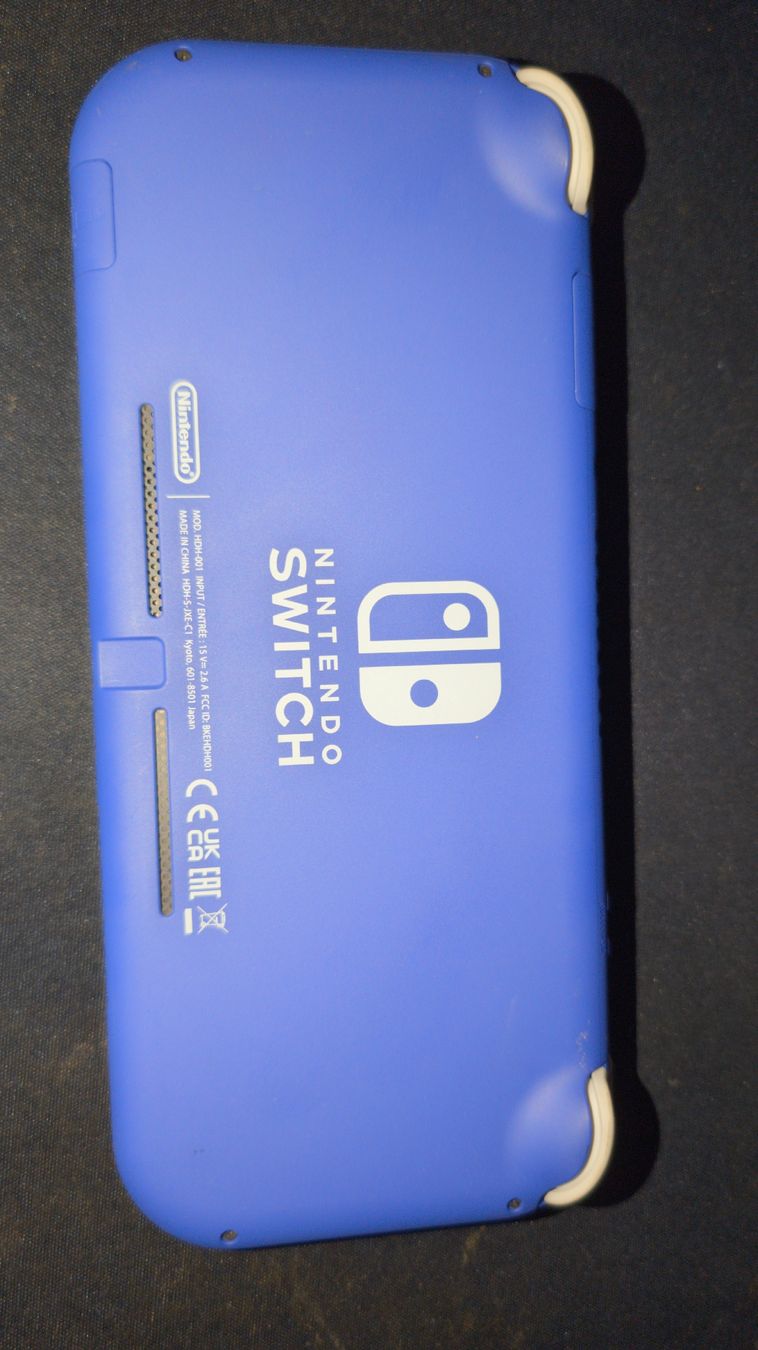 Nintendo Consoles: Nintendo Switch Lite Blau mit 2 Spielen – D'occasion à Trimbach par Mr.PA 1