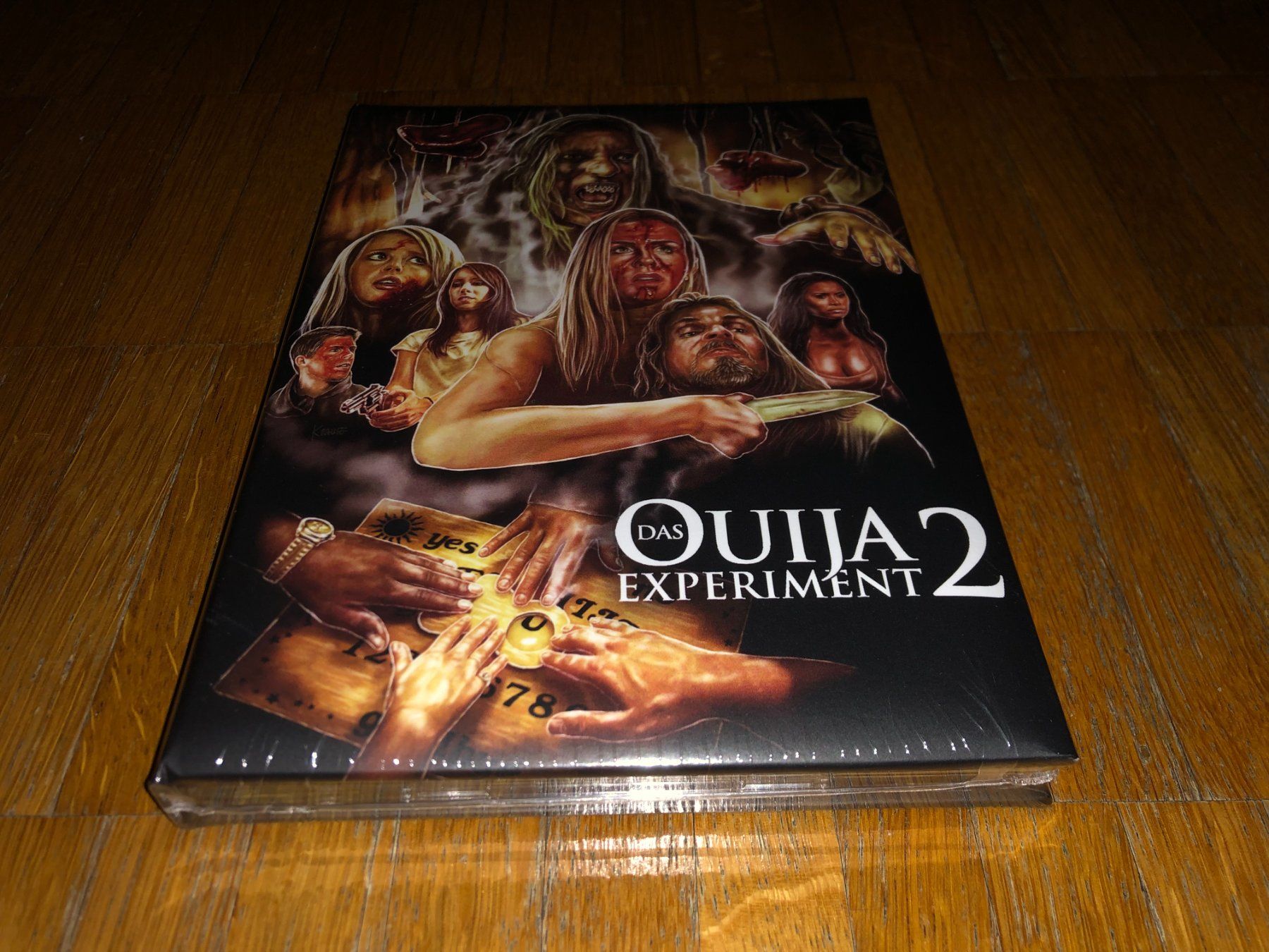 Tutti i DVDs: Ouija Experiment 2 - MEDIABOOK - WATTIERT - UNCUT – Nuovo e nell'imballaggio originale da Basel venduto da havsok
