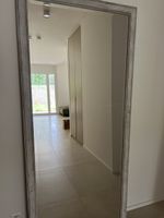 Mirror with wooden handcrafted frame