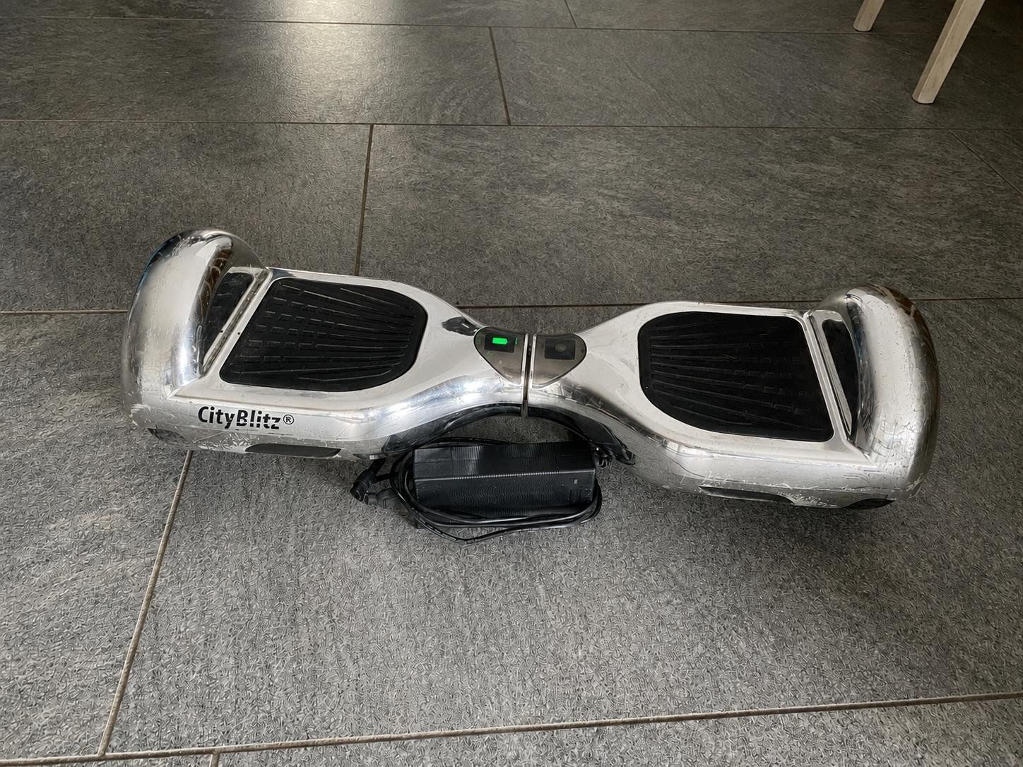 CityBlitz Hoverboard: Hoverboard CityBlitz cromato con caricatore, usato – Usato da Avegno venduto da SVColumbia