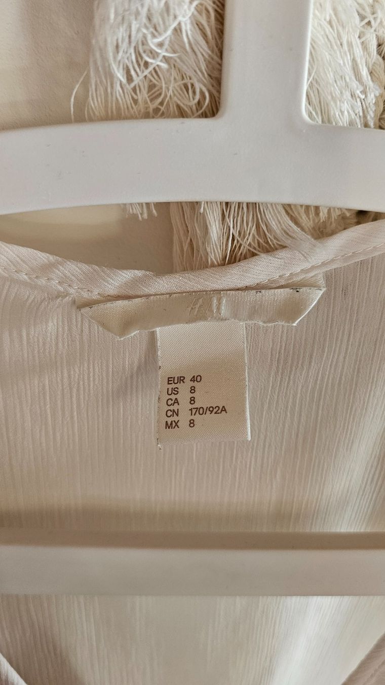 H&M Camicette: ärmellose Chiffonbluse mit Rüschenkragen – Usato da Buhwil venduto da Nici_la_nic 1