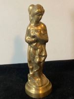 Weibliche Messing -Statue