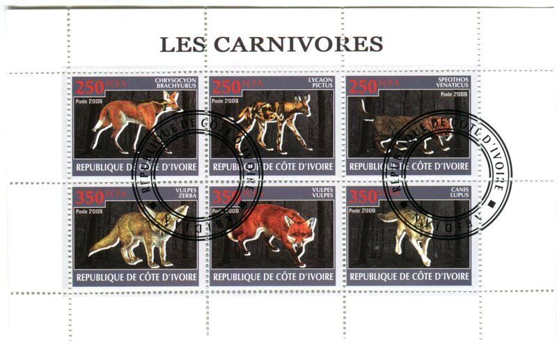Tous les timbres: Block "Wolf, Rotfuchs, Mähnenwolf, Fennek". Elfenbeinküste – Neuf avec emballage d'origine à Basel par Butsch5