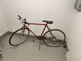 rotes Rennrad für Veloflick-Liebhaber