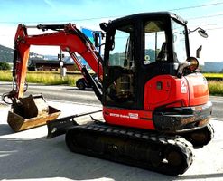 Bagger Hutter Kubota KX057-4 mit Oilquick Nr. 005