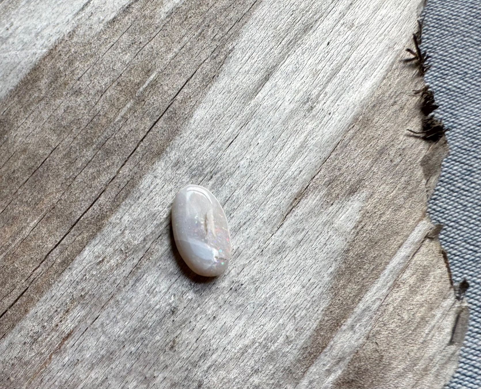 Fossili: winziger OPAL,   geschliffen poliert  12mm – Nuovo e nell'imballaggio originale da Leuggern venduto da gemshow 2
