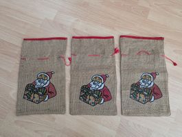 3 bedruckte Samichlaussäcke aus Jute