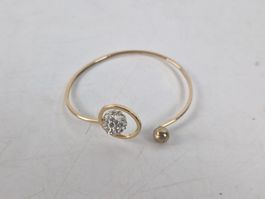 Metallarmband in Goldfarbe mit Strasssteinen