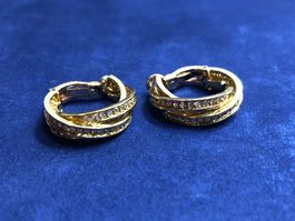 Creolen mit funkelnden Diamanten aus 18 Karat Gelbgold 750