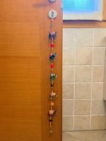 Decorazione di tanti elefantini multicolore con campanelli