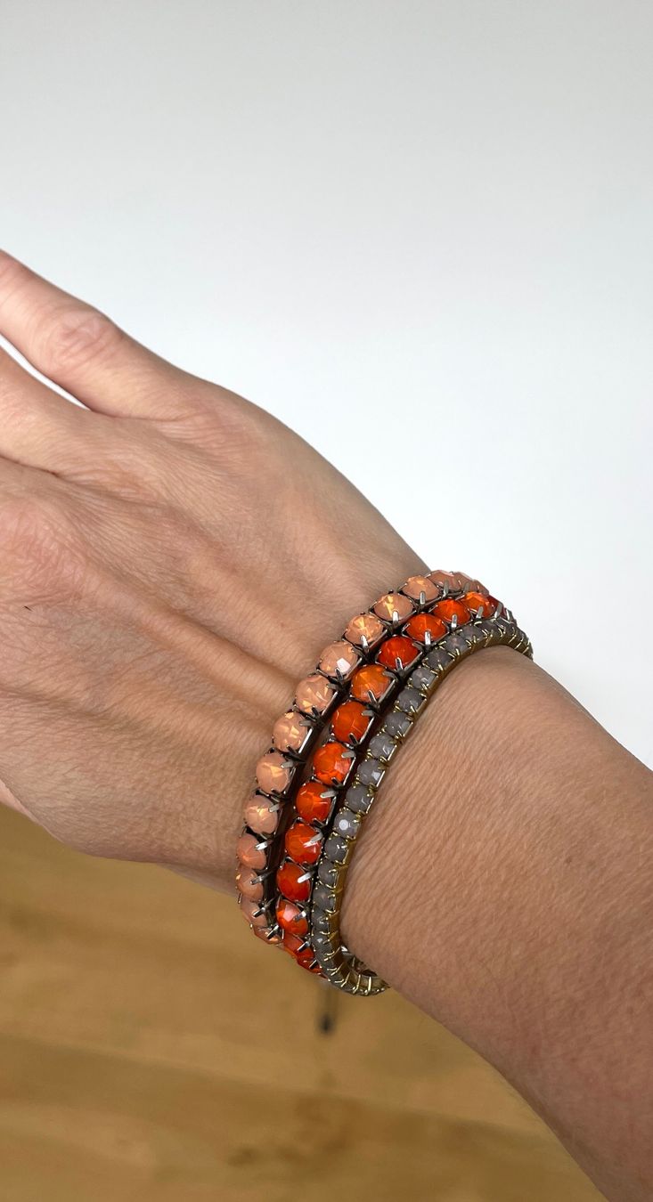 Bracciali & Braccialetti: 3 Stretcharmbänder – orange, lachs, olive – Usato da Grenchen venduto da M_ina 4