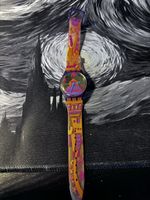 Montre Swatch originale multicolore style été, bon état