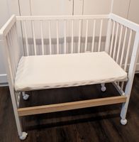 Beistellbett weiss mit Rollen 