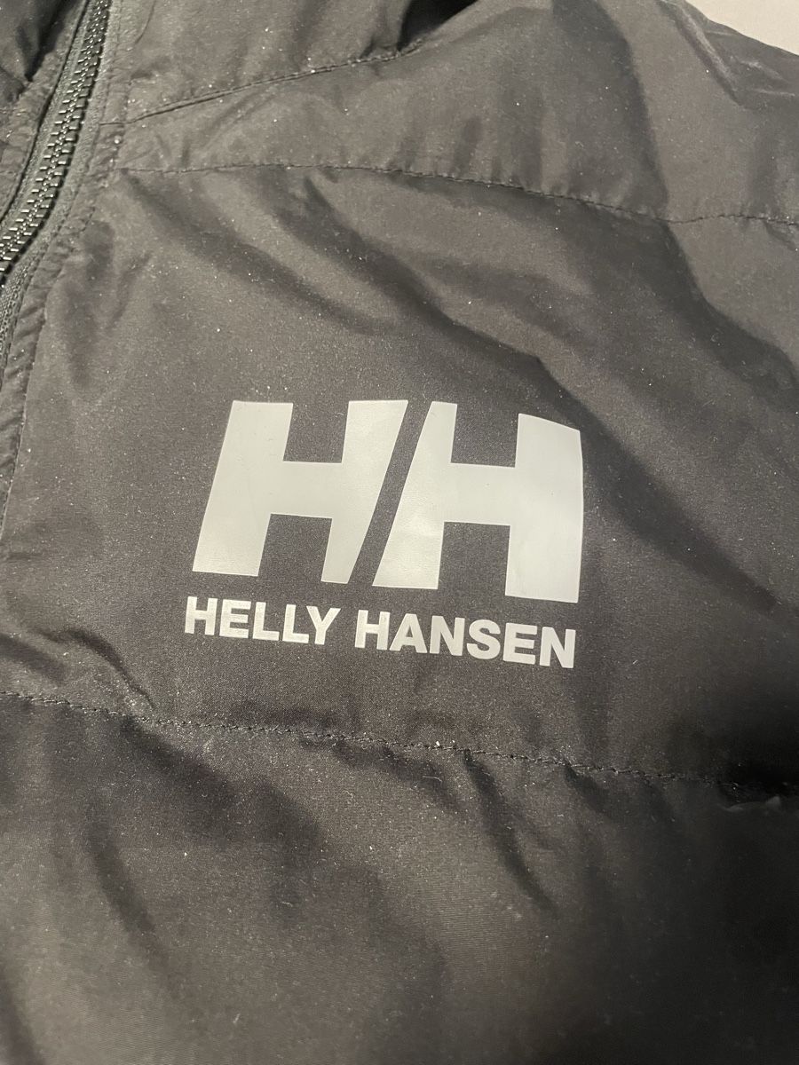 Helly Hansen Vestes: Helly Hansen Daunenjacke schwarz/silber Grösse M – D'occasion à Steinach par hue_85cr 1