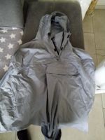 Graue Regenpancho mit Kapuze  Einheitbgrsösse Postversa