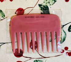Rosa Kunststoff-Kamm "IncaSSable Swiss made" - Top Zustand!