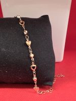 Armband goldfarben mit Herzmotiven und Steinen neu